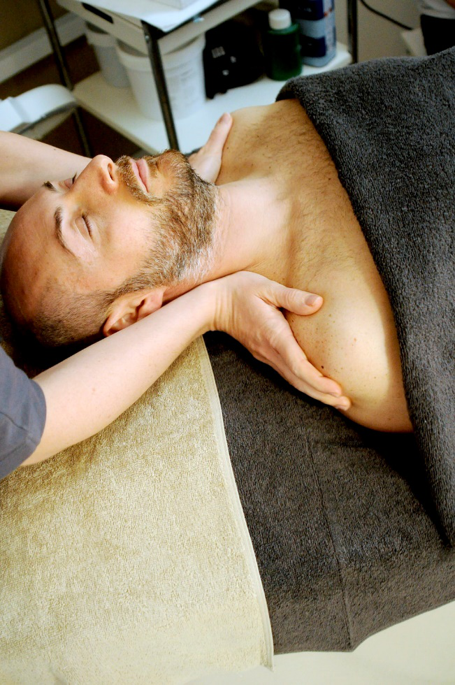 An image showing a person getting a massage